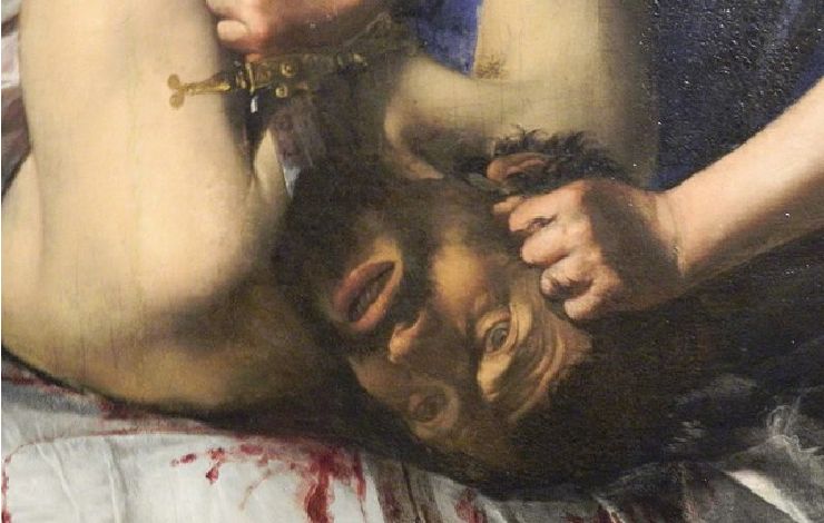Oloferne di Gentileschi: testa di uomo staccata dipinta